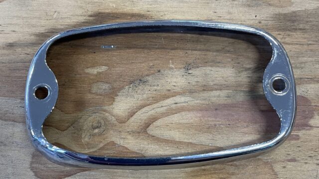 Triumph reverse light chrome bezel